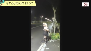 slut takes off her cloak in public